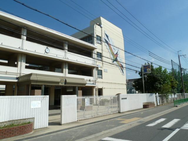 東奈良高層住宅Ｅ棟　茨木市立天王中学校　約1120ｍ